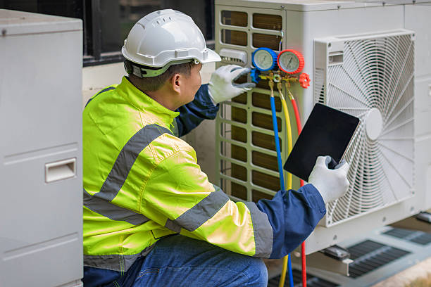 Professional Air Conditioning Repair technician working in Rice, TX
